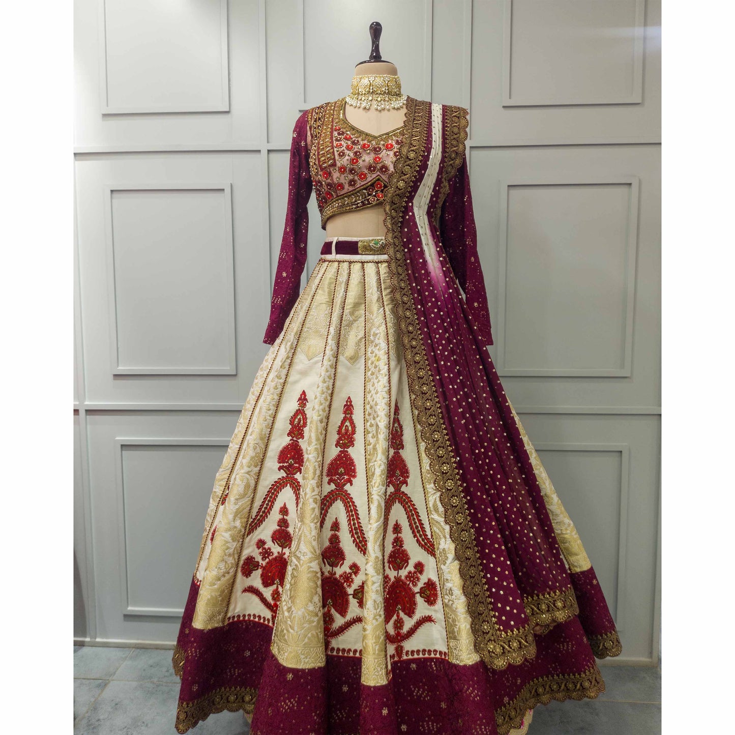 Zardozi & Aari Embroidered in Gold Off-White, and Rich Wine & Red Hues Lehenga