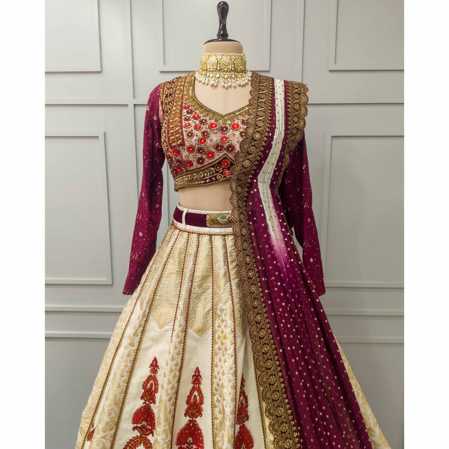 Zardozi & Aari Embroidered in Gold Off-White, and Rich Wine & Red Hues Lehenga